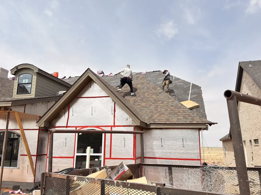 New construction roofing on a custom home built by Crystal Cabinets Inc. in Midland TX