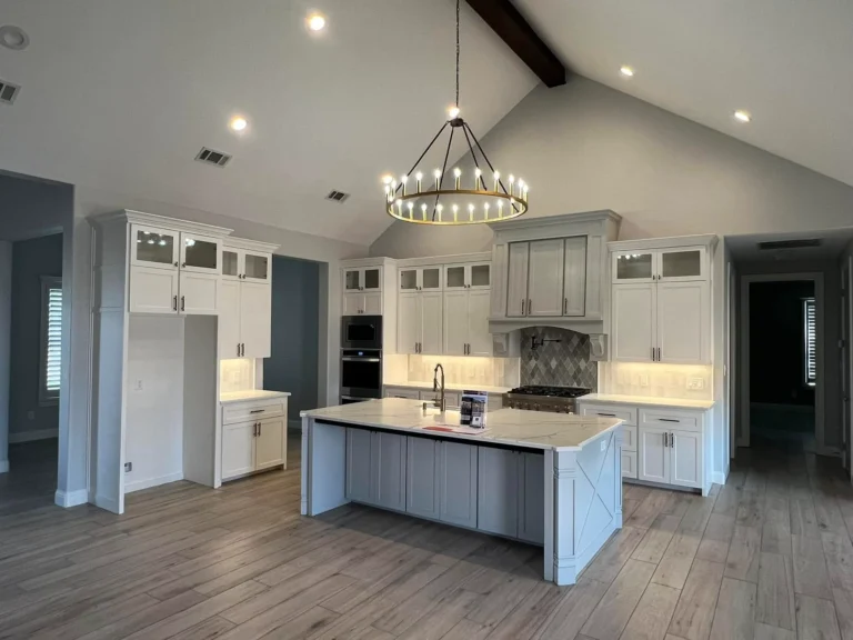 Custom kitchen remodel with white cabinets and granite countertops completed by Crystal Cabinets Inc in Midland TX
