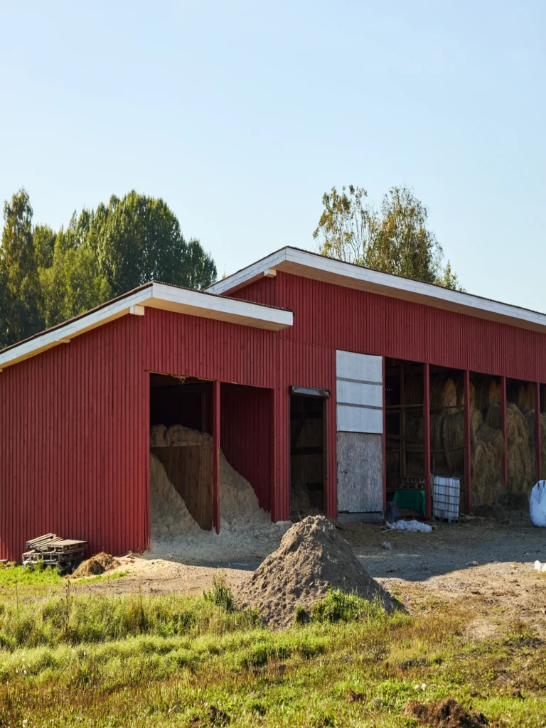 Agricultural barn with metal siding and hay storage area in midland texas