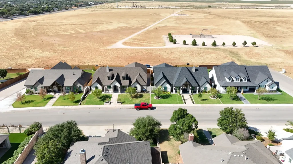 Four new custom homes built by Crystal Cabinets Inc. side by side in Mockingbird Heights, Midland, TX